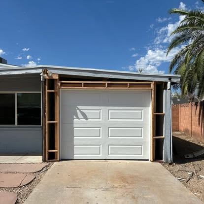Aluminum full-view garage door on a modern Arizona home
