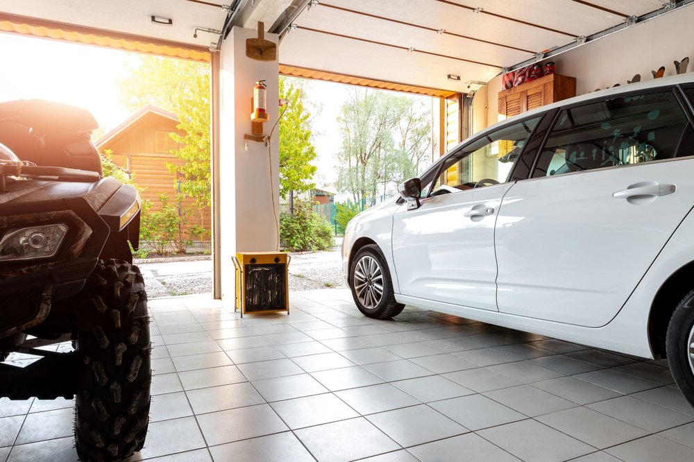 Open garage with new doors and epoxy floor in Arizona